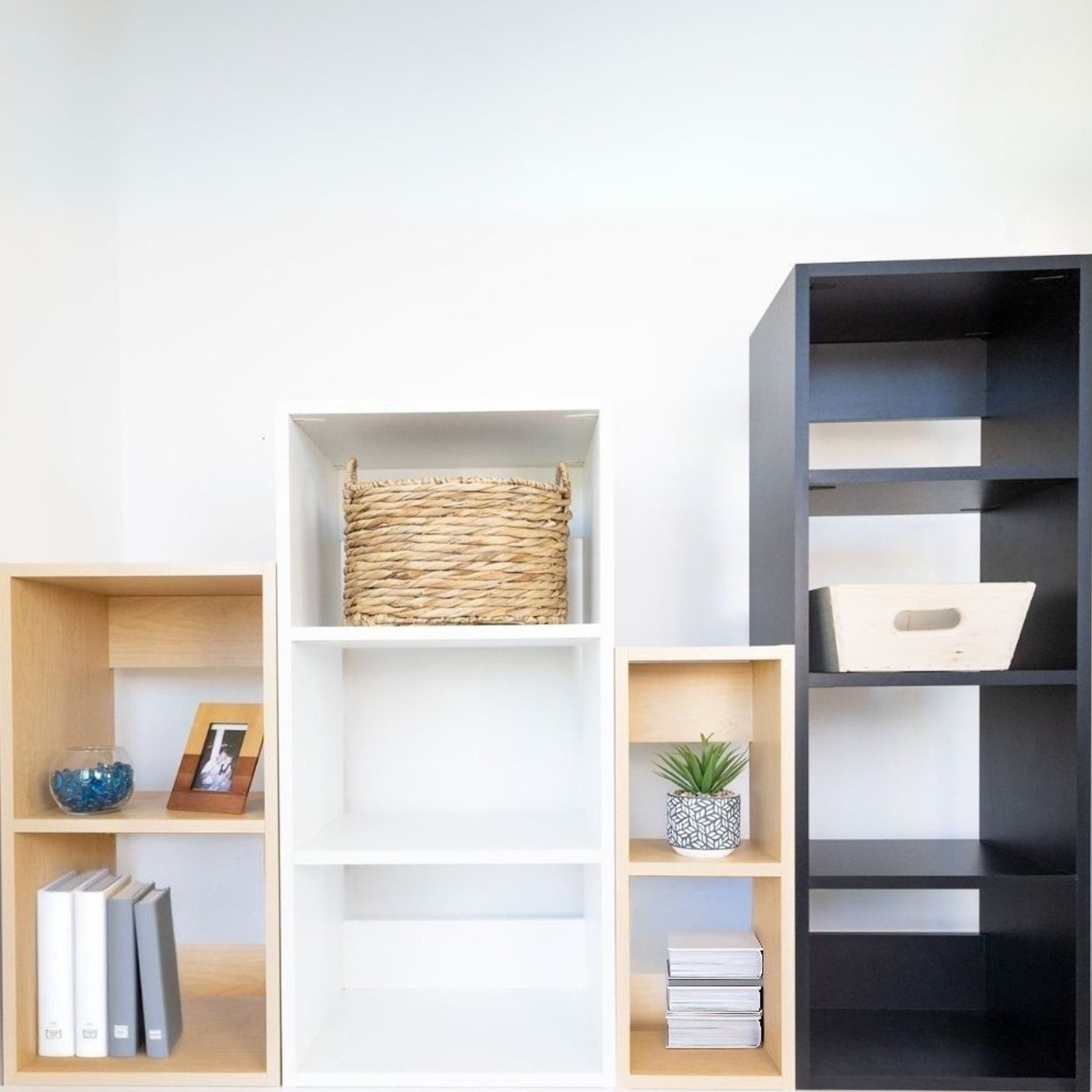 Set of custom sized cubbies in various colors against a white background